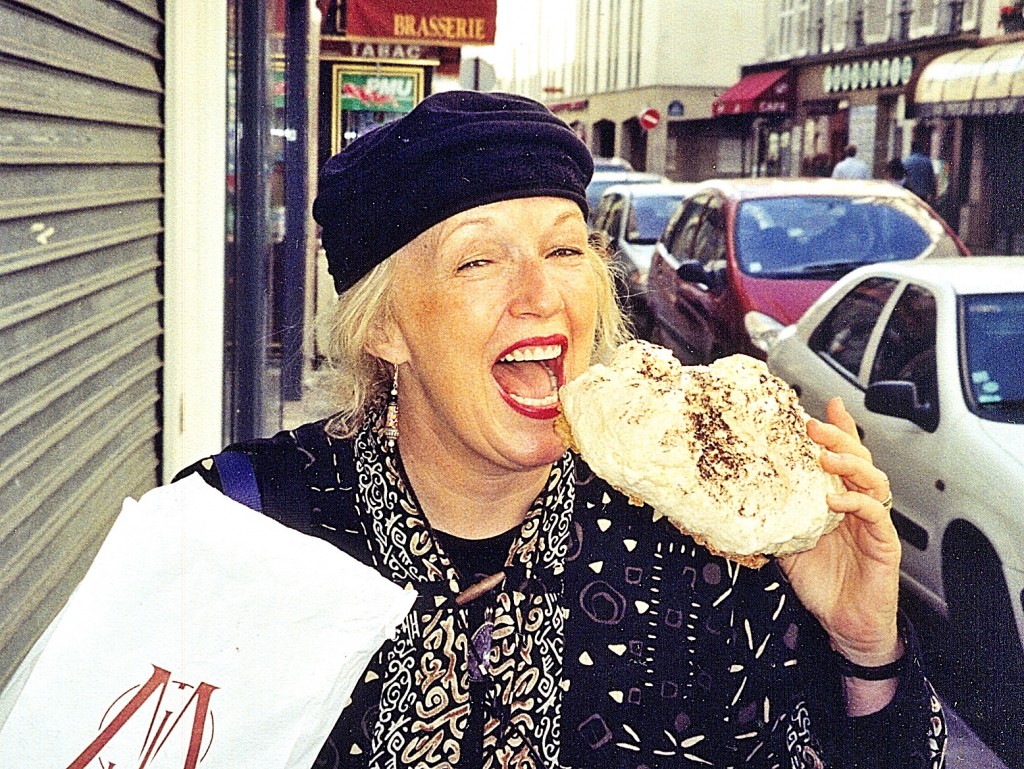 Eating a meringe. Paris, France in 2004